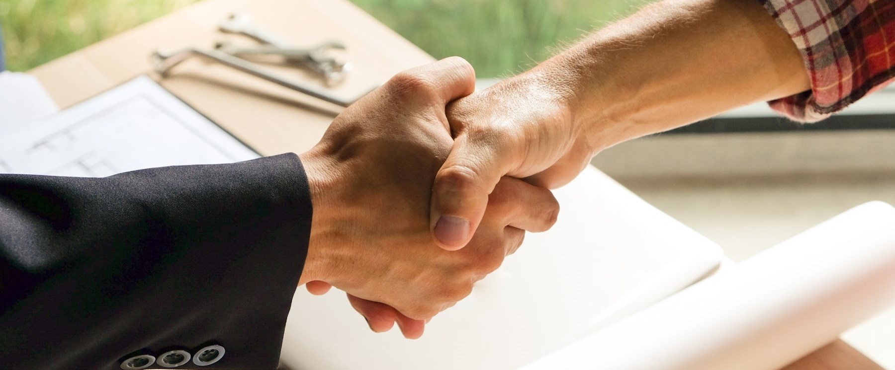 two men shaking hands